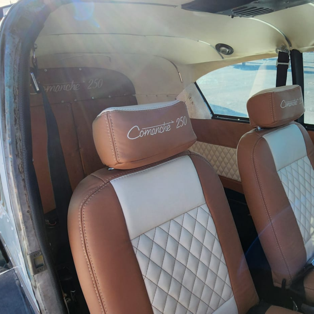 4 seat aircraft interior fully reupholstered in white/grey fabric
